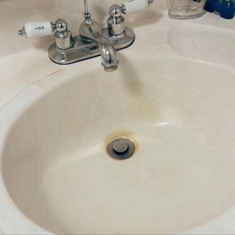 Bathroom sink and faucet cleaned (after)
