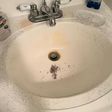 Bathroom sink before cleaning