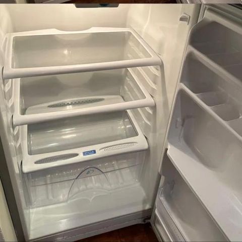 Refrigerator shelves and drawers cleaned (after)